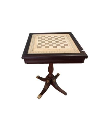 an image of a wooden table with a chess board on it