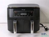 an image of a black air fryer sitting on top of a counter