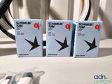 two boxes of schwabe tube sitting on a table next to a pair of scissors