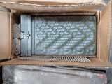 a microwave sitting inside of a box on top of a table