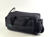 a black bag that is sitting on a white surface