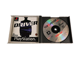 a cd in a box with a driver on it