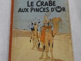 un vieux livre sur lequel figure l'image d'un homme à dos de chameau