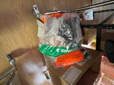 many boxes of items on a shelf in a room