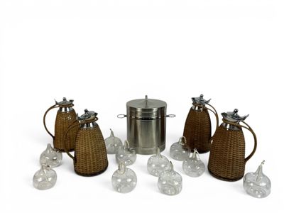 a lot of glass and metal items that are on the table