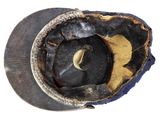 a close up of a baseball cap with a leather band