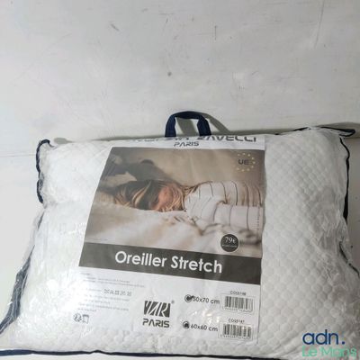 a pillow that has a picture of a cat sleeping on it
