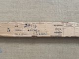 a piece of paper with writing on it sitting on a table
