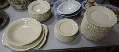 a table with many plates and bowls on it