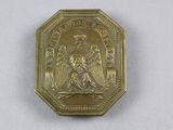 l'image d'une pièce d'or ornée d'un aigle