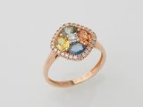 a yellow gold ring with multi colored stones and diamonds
