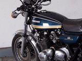 a motorcycle that is parked in a garage