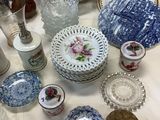a table with a lot of plates and bowls on it