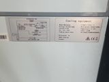 a close up of a white refrigerator in a kitchen