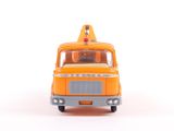 an orange toy truck with a man in the back of it
