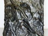 sculpture of a group of soldiers in a field with a flag