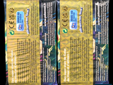three packets of cigarettes are lined up on a black background