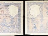 deux anciens billets de banque sur lesquels figurent les portraits d'un homme et d'une femme