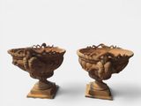two vases that are sitting next to each other on a table