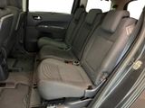 the interior of a car with the front seats down and the back seats down
