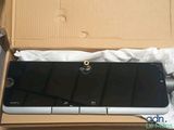 an open box with a phone inside of it sitting on a table