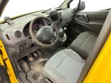 a small yellow car with a steering wheel and dashboard