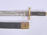 two knives are laying side by side on a white surface