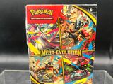a box of pokemon mega evolutions cards on display