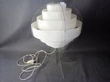 an image of a white bowl with a wire attached to it