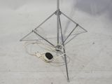 a light that is on top of a tripod stand