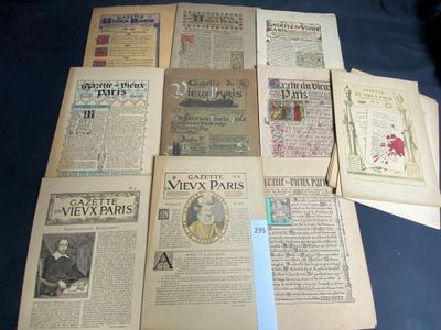 a lot of old newspapers sitting on a blue table