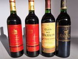 trois bouteilles de vin rouge sont alignées sur une table