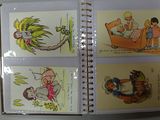 several children ' s books are lined up on a table
