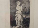 an old picture of a woman holding a flower in her hand