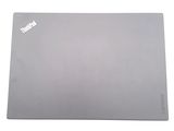 a laptop that is sitting on a white surface