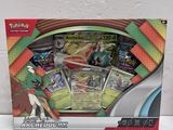 La boîte contient toute une série de cartes Pokémon.