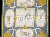 yellow and blue square scarf with a picture of a horse drawn on it