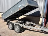an image of a trailer that is parked in front of a building