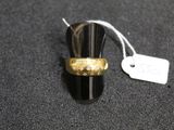 a ring that is on top of a black table