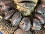 a picture of a face made out of wooden beads