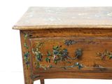 a wooden table with a drawer on top of it