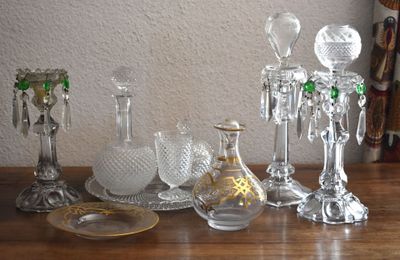 a table with a lot of glass items on it