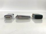 two lighters sitting next to each other on a table