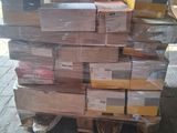 many boxes stacked on top of each other on a pallet