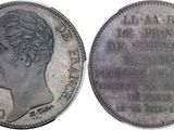a close up of a coin with a woman ' s face on it