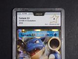 an image of a pokemon trading card with a picture of a blue and white pokemon