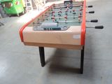 a foosball table in the middle of a room