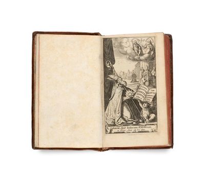 un livre ouvert sur lequel figure le dessin d'un homme et d'une femme