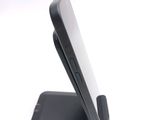 a cell phone that is sitting on top of a stand