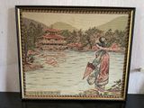 an image of a picture of a woman with a parasol on a table